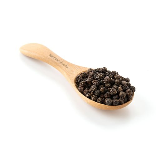 Black pepper in a spoon